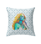 Petal Perfection Indoor Pillow on a luxurious sofa.